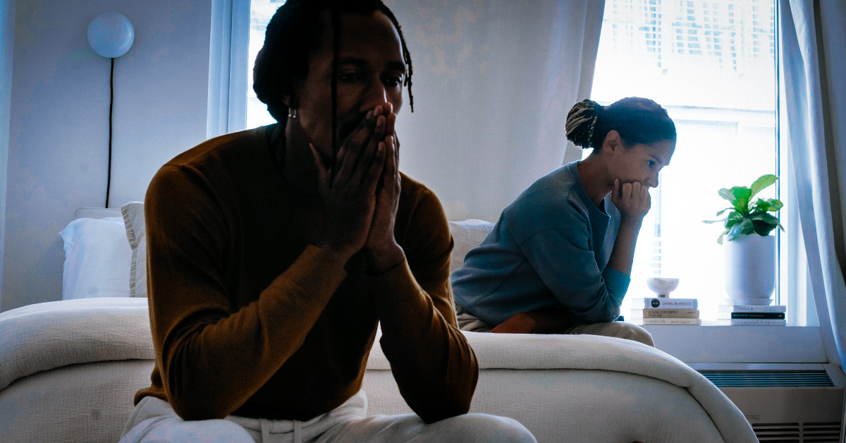 Silhouettes of a couple caught in a heated argument