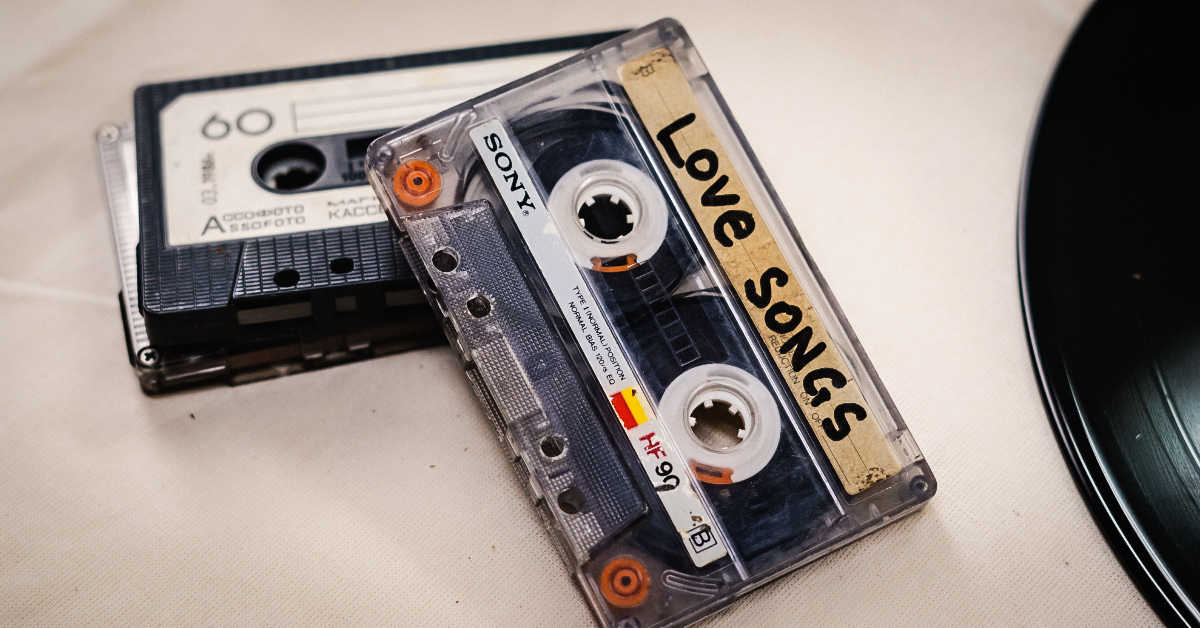 Cassette tapes with love songs written on it to symbolize old school love