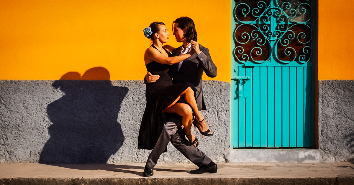A couple dancing the Tango, symbolizing the dance of authenticity in relationships.