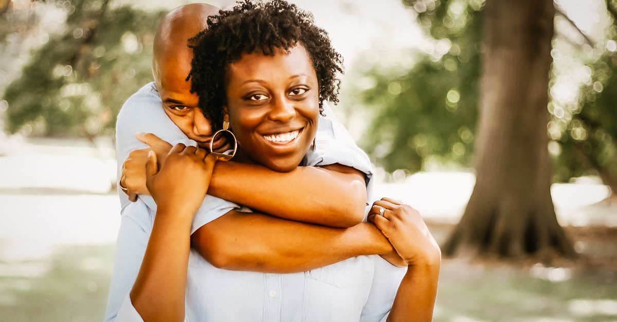 Couple embracing passionately, finding balance in their relationship.