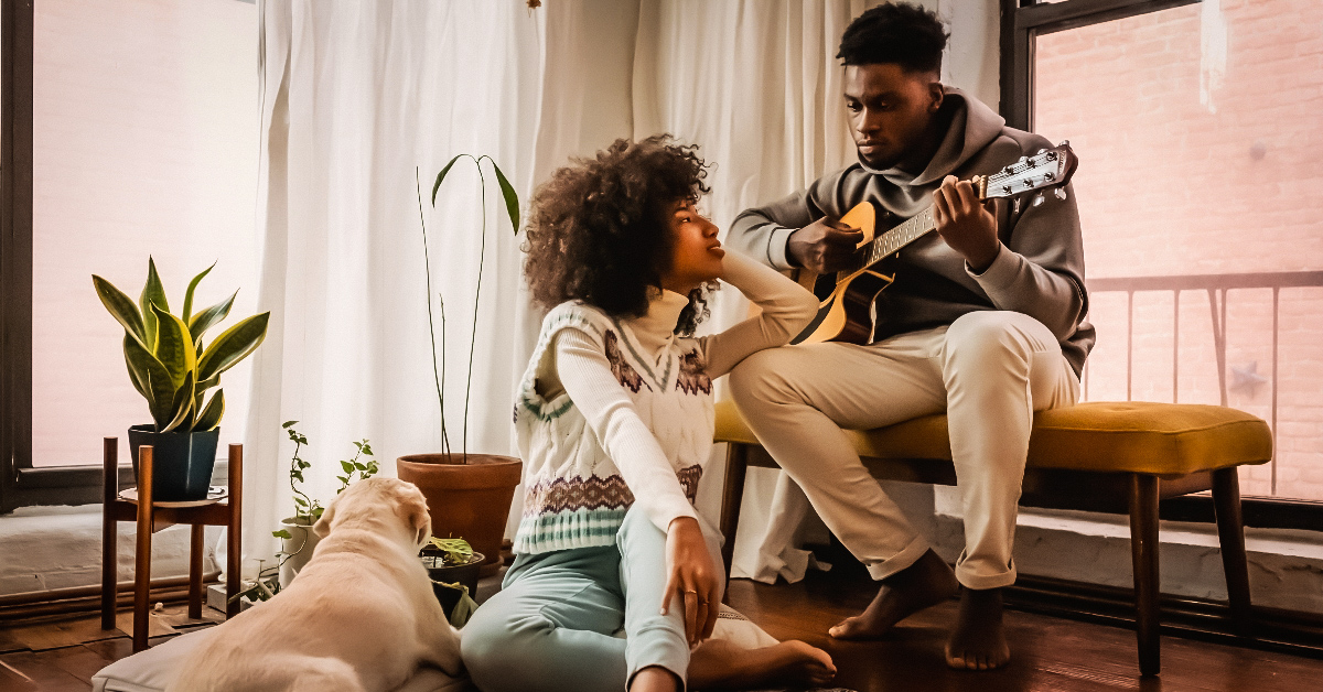 man playing music symbolizing the need for male emotional expression in music.