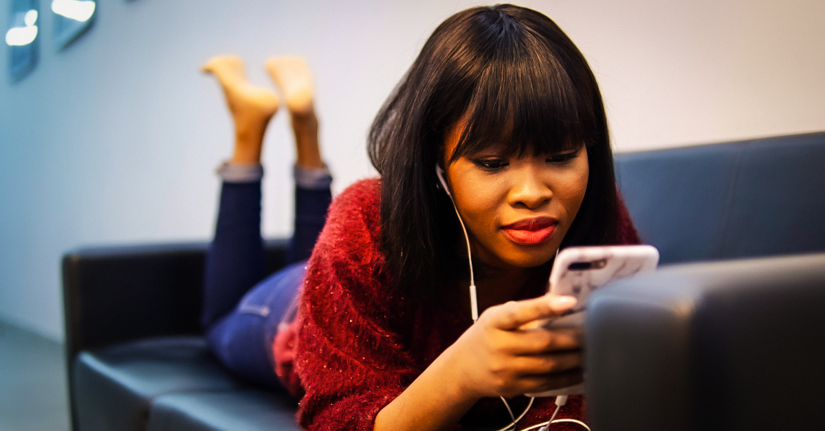 A person enthusiastically watching Youtube videos